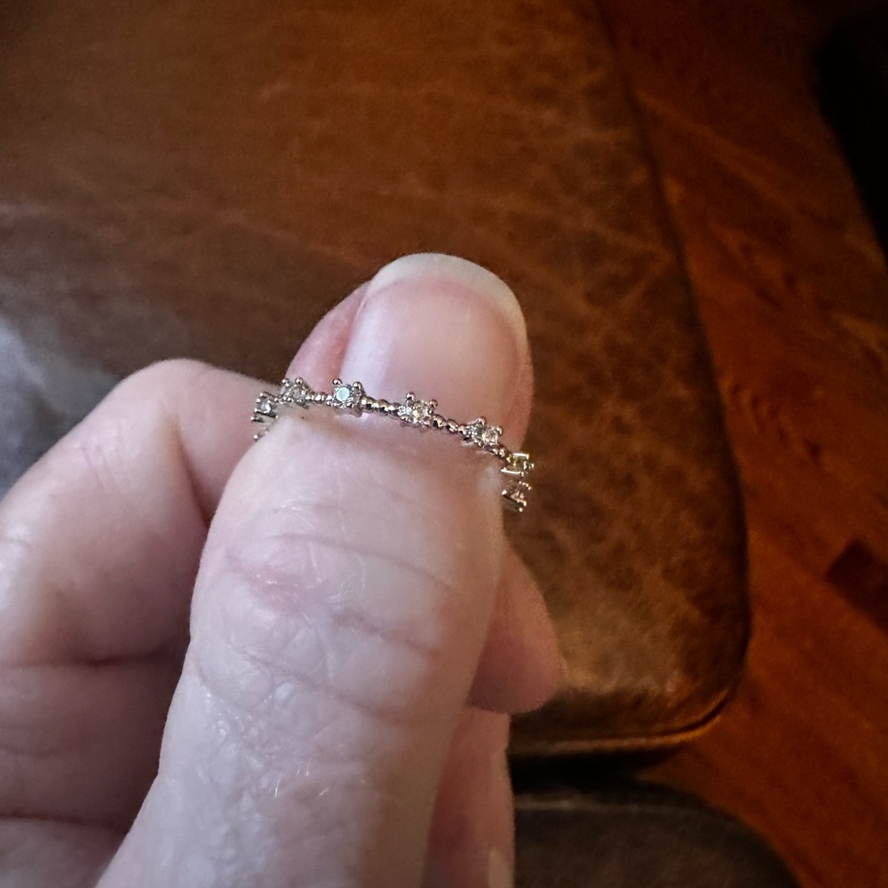 Silver detailed band with rhinestones Women's size 8 Ring
